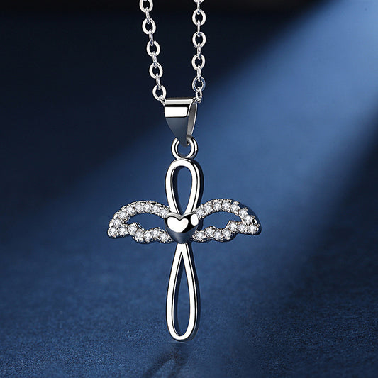 Curaçao Angel cross pendant