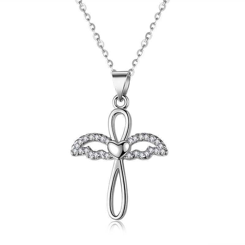 Curaçao Angel cross pendant