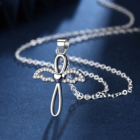 Curaçao Angel cross pendant
